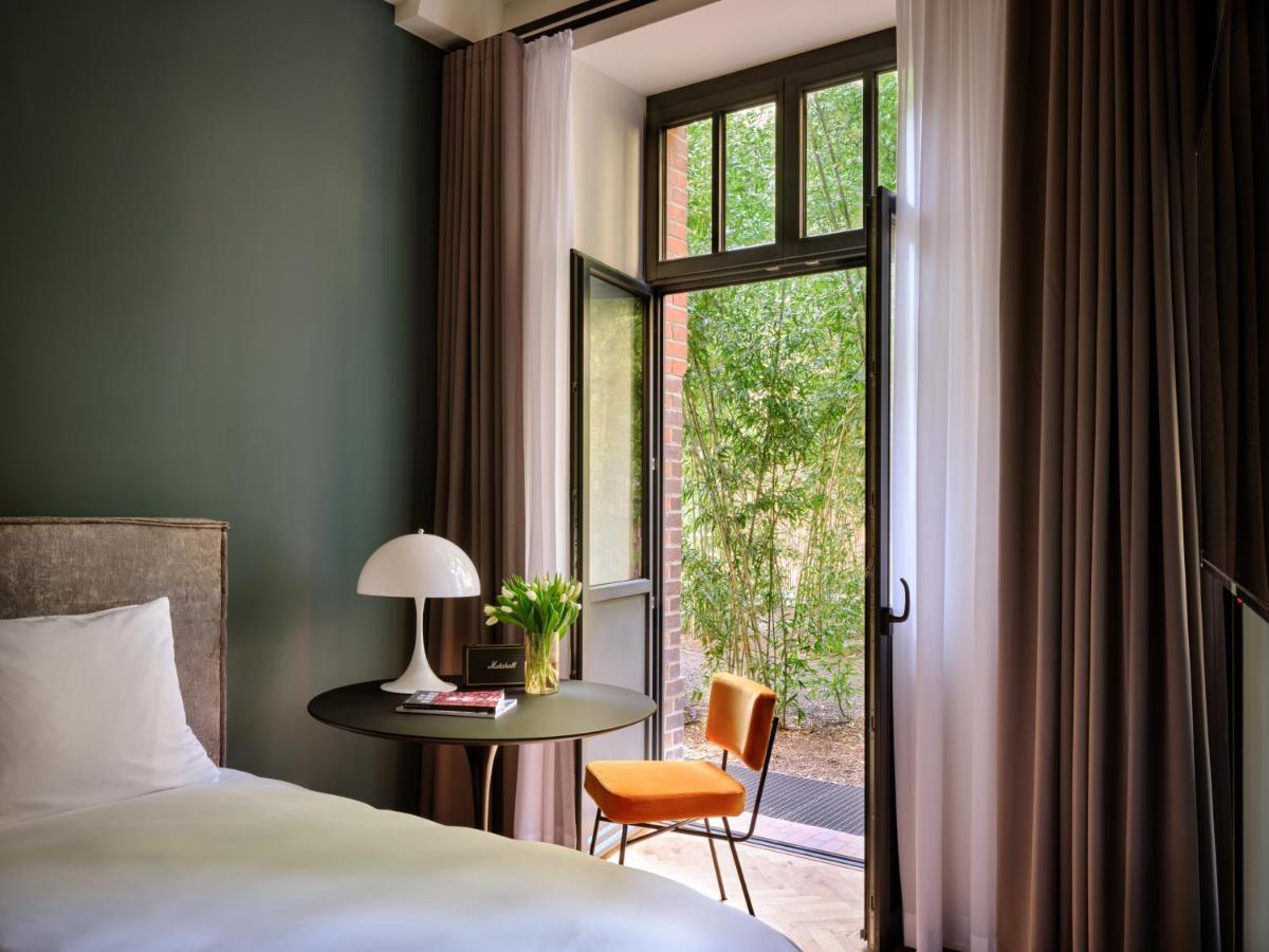 Sly Berlin Hotel Bagian luar foto A room at the Hotel
